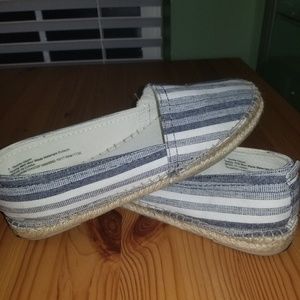 Striped slip on flats lightly worn.